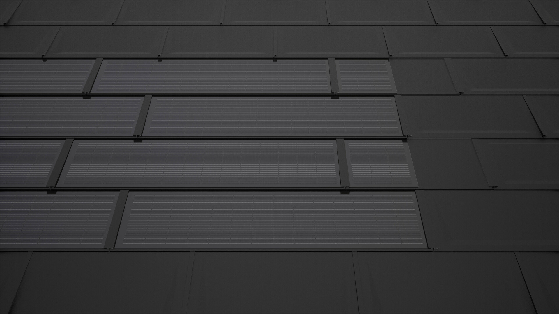 PREFA solarni krovni paneli u crnoj boji s dodatnim panelima. Osiguravaju pravokutnu površinu modula i doprinose skladnom cjelokupnom izgledu solarnog krova.