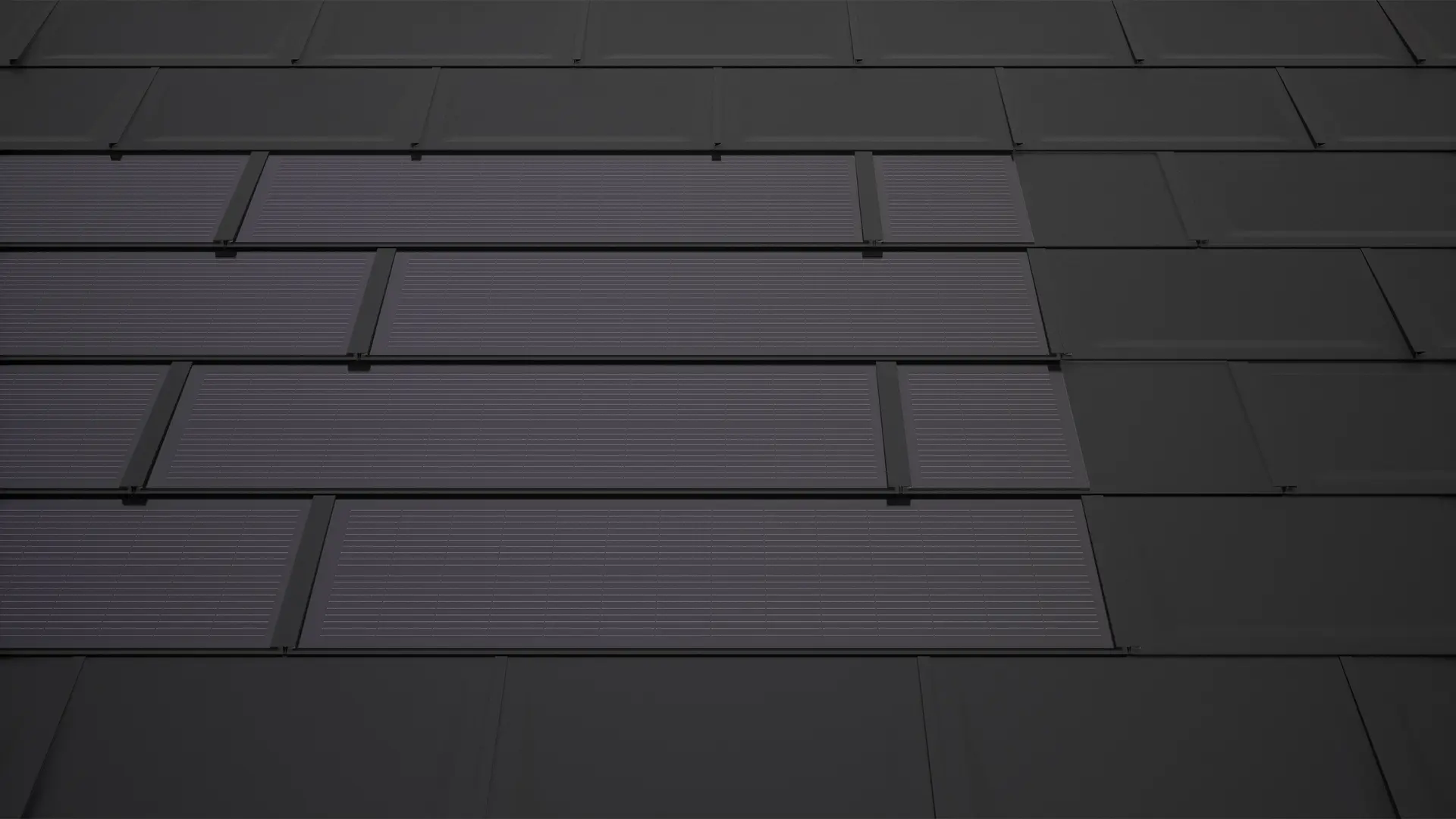 PREFA solarni krovni paneli u crnoj boji s dodatnim panelima. Osiguravaju pravokutnu površinu modula i doprinose skladnom cjelokupnom izgledu solarnog krova.